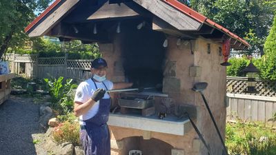 Martin Barnett at his backyard brick oven