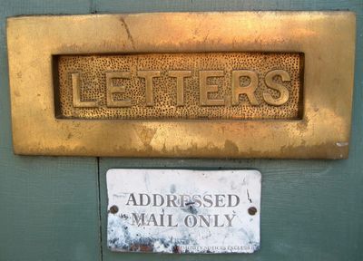 a door with a letter slot